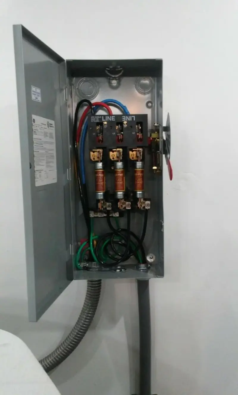 Three-phase disconnect switch installed for Smoke Detector Installation in King